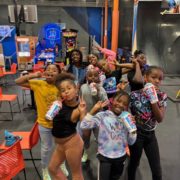 Little girls posing together for group photo